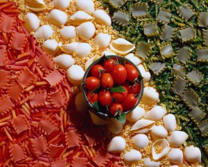 Bowl of Tomatoes on Tricolored Pasta
