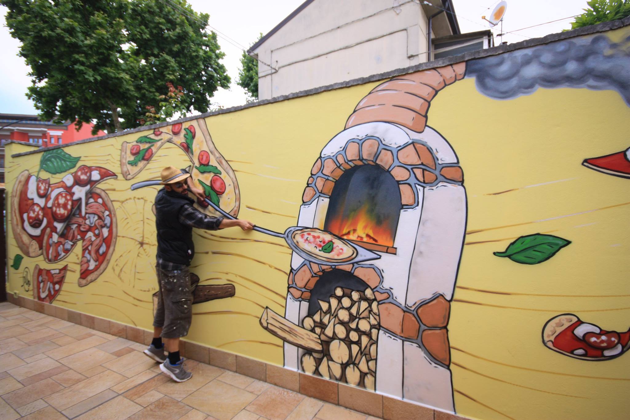 Street Artist Paints Pictures of Food Over Hateful Graffiti « Italy Travel